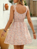 Alida - Robe bohème à imprimé floral et col en V sans manches