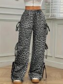 Ayana - Pantalon à jambes larges avec imprimé léopard et nœud sur le côté